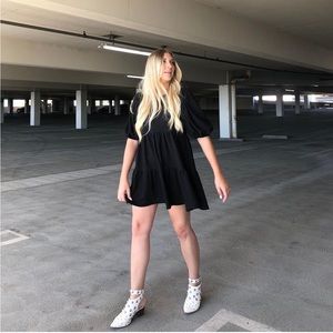 Black baby doll dress with puff sleeves in size Large.